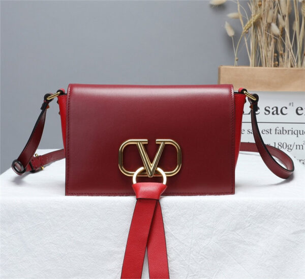 Valentino Garavani VRING Small leather crossbody Bags in red