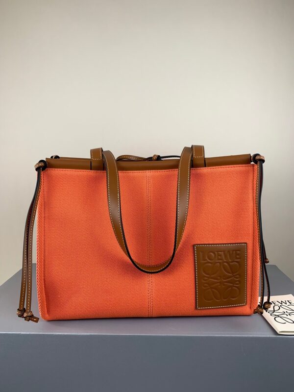 Loewe Cushion large leather-trimmed canvas tote Orange